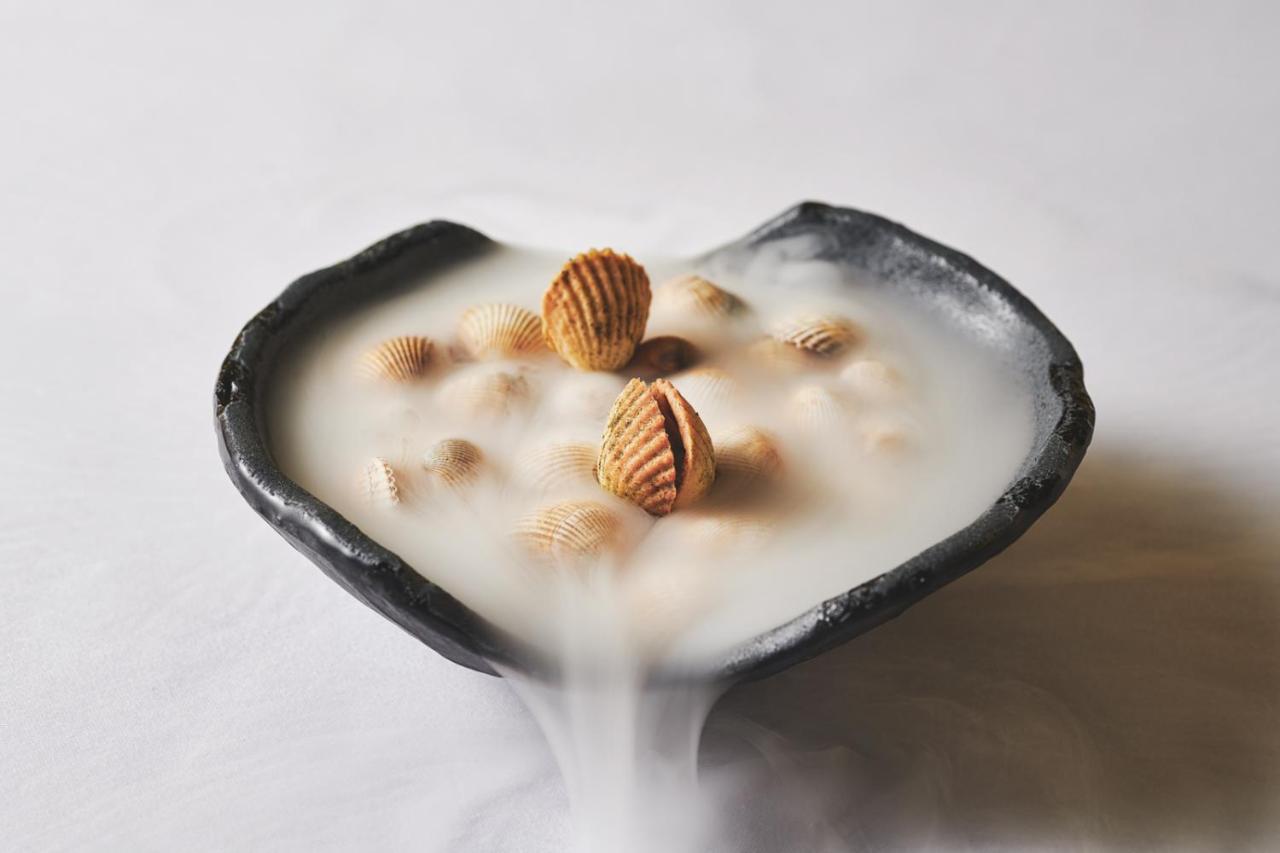 Vila Foz Hotel & Spa - Member Of Design Hotels Porto Kültér fotó A bowl of dry ice with peanuts